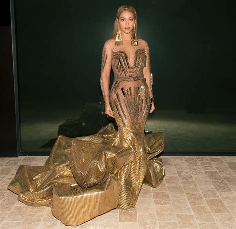 beyonce gold dress